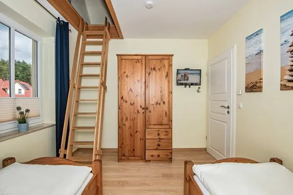 Schlafzimmer  Ferienhaus Angela 2