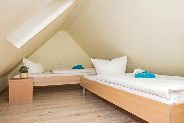 Schlafzimmer  Ferienhaus Angela 2