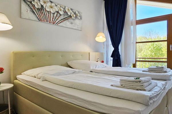 Wohnanlage "Am Grün" Sonnenherz Wittenbeck - Schlafzimmer