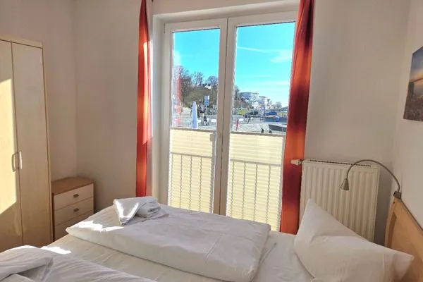 Schlafzimmer  Ferienwohnung Kutterfisch - direkt im Stadthafen