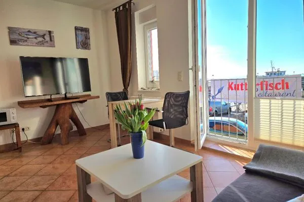 Wohnzimmer  Ferienwohnung Kutterfisch - direkt im Stadthafen