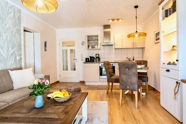 Blick zum Essbereich mit Küche  Villa Carpe Diem - Wohnung 2