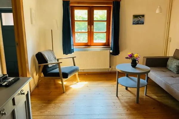 Wohnzimmer  Ferienhaus Häuschen im Norden