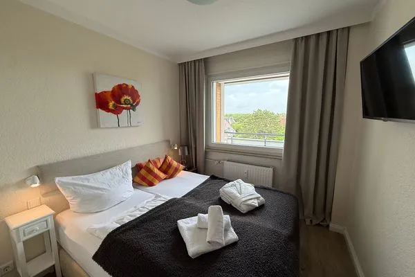 Schlafzimmer Ferienwohnung im Haus Nordland App 88