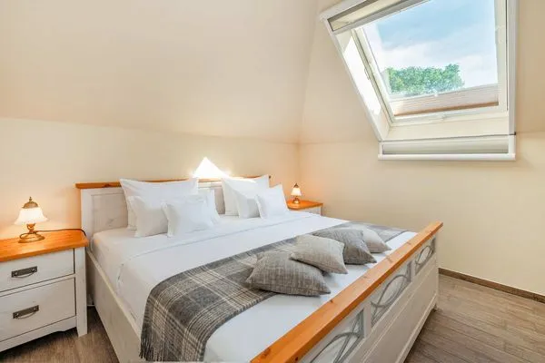 Schlafzimmer  Ferienwohnung Koserow