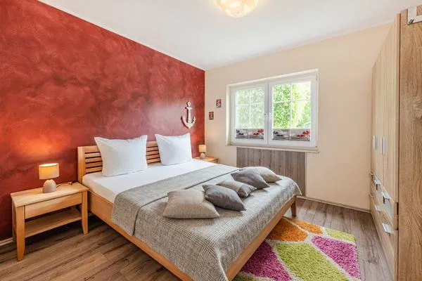 Schlafzimmer  Ferienwohnung Koserow EG