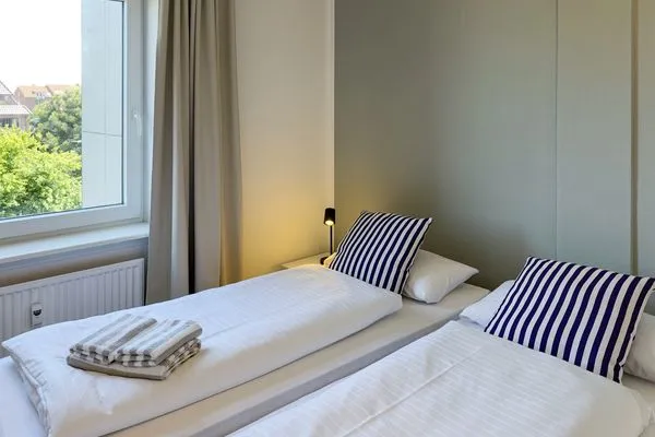 Schlafzimmer Haus Nordenlicht Ferienwohnung "Lütj Seeröver"