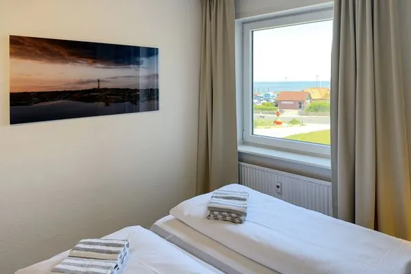 Schlafzimmer Haus Nordenlicht Ferienwohnung "Lütj Seeröver"