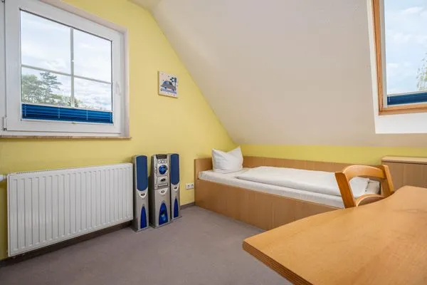 Schlafzimmer mit zwei Einzelbetten Am Deich Am Deich Haus 16 - Ostseewelle