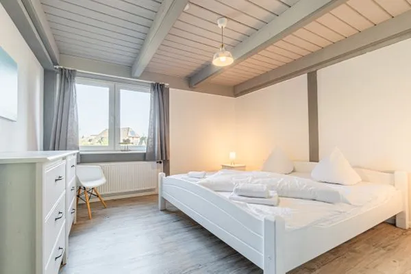 Schlafzimmer  Ferienwohnung Meeresrauschen Pellworm