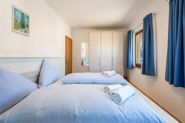 Ferienhaus Kuprella Ferienwohnung Kuprella 1 Nonnenhorn - Schlafzimmer - Doppelbett