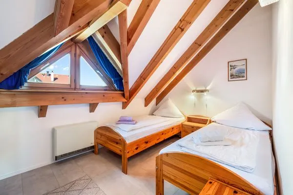 Ferienhaus Kuprella Ferienwohnung Kuprella 2 Nonnenhorn - Schlafzimmer 2 - Einzelbetten