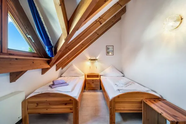 Ferienhaus Kuprella Ferienwohnung Kuprella 2 Nonnenhorn - Schlafzimmer 2 - Einzelbetten