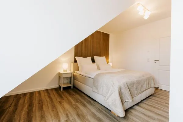 Schlafzimmer  de Diek - Suite 2 | Direkte Deichlage - Hafenblick