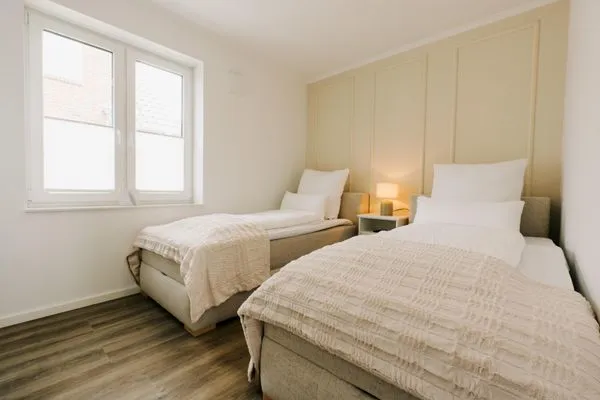 Schlafzimmer  de Diek - Suite 2 | Direkte Deichlage - Hafenblick