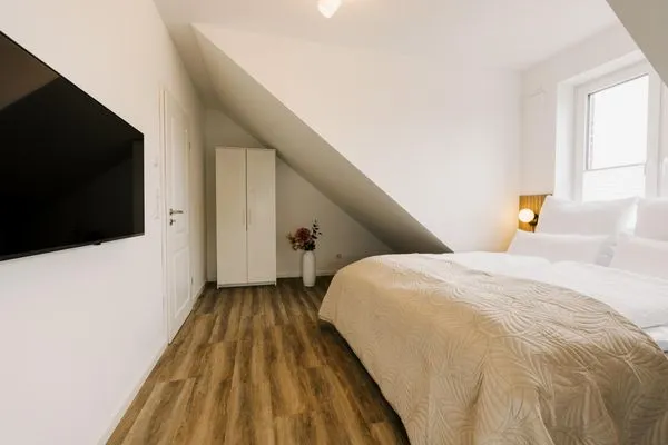 Schlafzimmer  de Diek - Suite 4 | Seitliche Deichlage