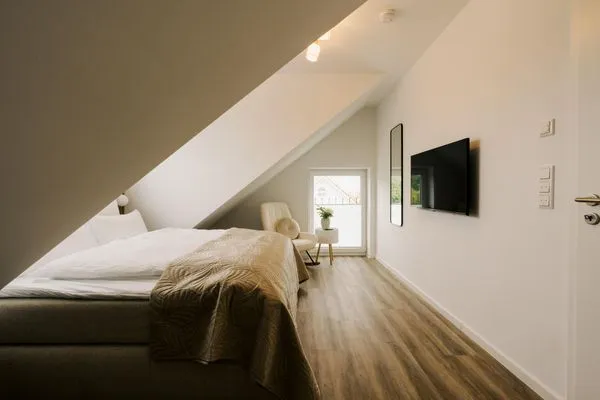 Schlafzimmer  de Diek - Suite 4 | Seitliche Deichlage