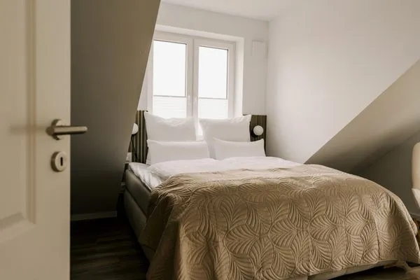 Schlafzimmer  de Diek - Suite 4 | Seitliche Deichlage