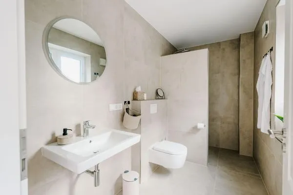 Badezimmer  de See - Suite 1 | Direkte Deichlage