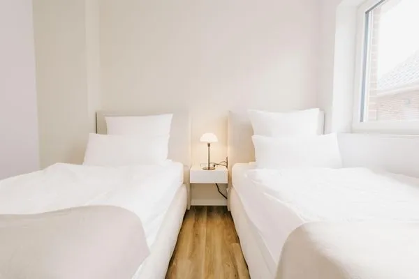 Schlafzimmer  de See - Suite 4 | Seitliche Deichlage