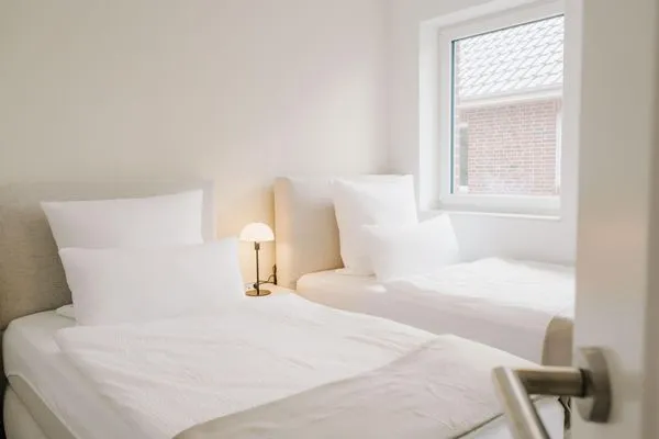 Schlafzimmer  de See - Suite 4 | Seitliche Deichlage