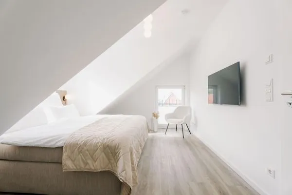 Schlafzimmer  de See - Suite 4 | Seitliche Deichlage