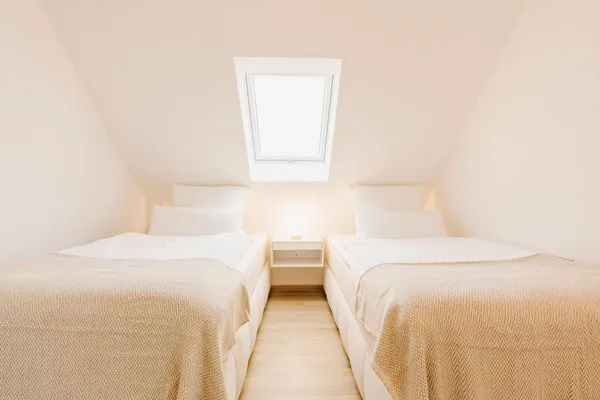 Schlafzimmer  Grachten Suite 1 | Direkte Wasserlage