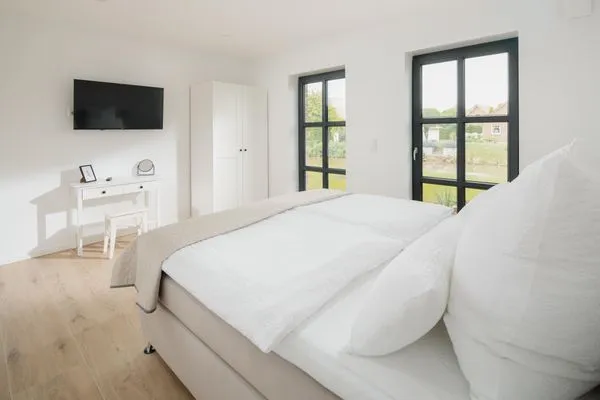 Schlafzimmer  Suite Nord | Direkte Wasserlage