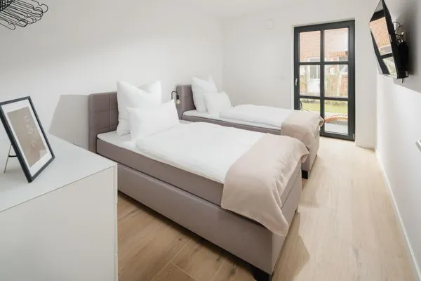 Schlafzimmer  Suite Nord | Direkte Wasserlage