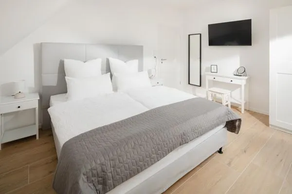 Bett  Suite Ost | Direkte Wasserlage