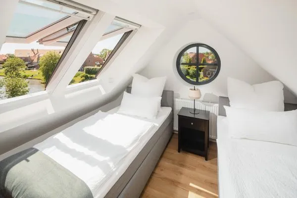 Schlafzimmer  Suite Ost | Direkte Wasserlage