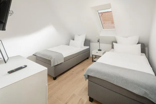 Schlafzimmer  Suite Ost | Direkte Wasserlage