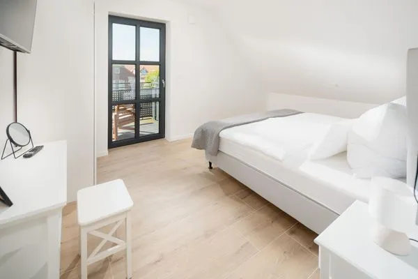 Schlafzimmer  Suite Ost | Direkte Wasserlage
