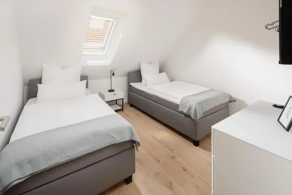 Schlafzimmer  Suite West | Seitliche Wasserlage