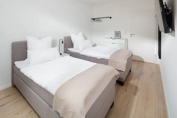 Schlafzimmer  Suite Süd | Seitliche Wasserlage