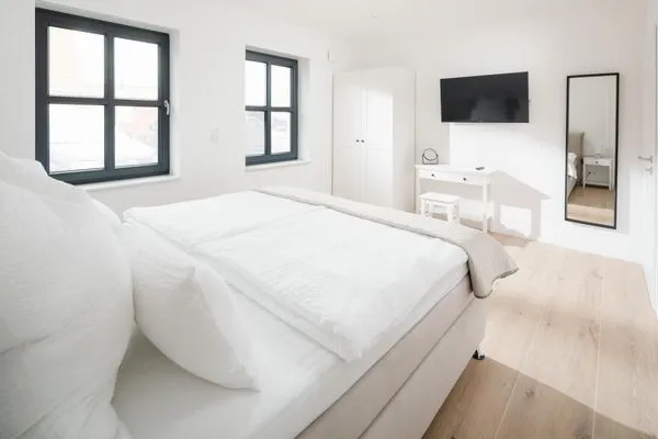 Schlafzimmer  Suite Süd | Seitliche Wasserlage