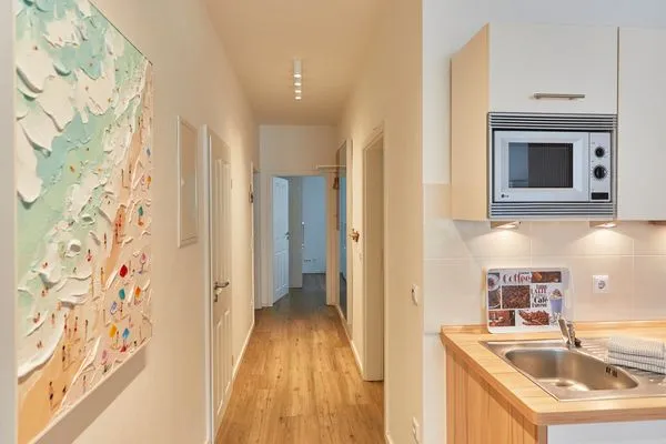 Flur mit Zugang zu den Schlafzimmern  Villa Pirola - Ferienwohnung 1