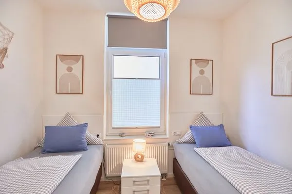 Schlafzimmer  Villa Pirola - Ferienwohnung 1