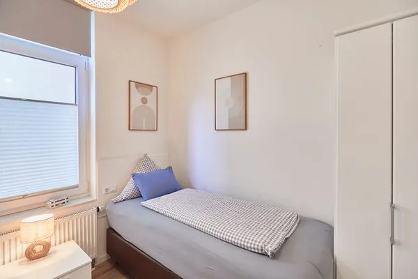 Schlafzimmer  Villa Pirola - Ferienwohnung 1