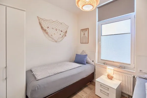 Schlafzimmer  Villa Pirola - Ferienwohnung 1