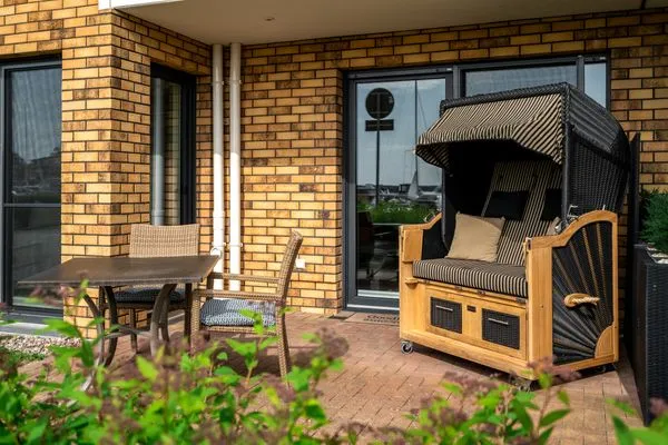 Ferienwohnung Fischotter Waren (Müritz) - Terrasse mit Strandkorb  Fischotter