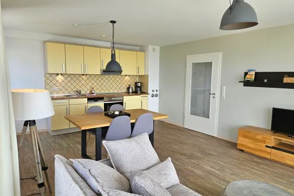Gemütliches Wohnzimmer mit moderner Ausstattung. Ideal zum Entspannen oder Essen. Strandoase Sierksdorf Strandoase Strandmuschel
