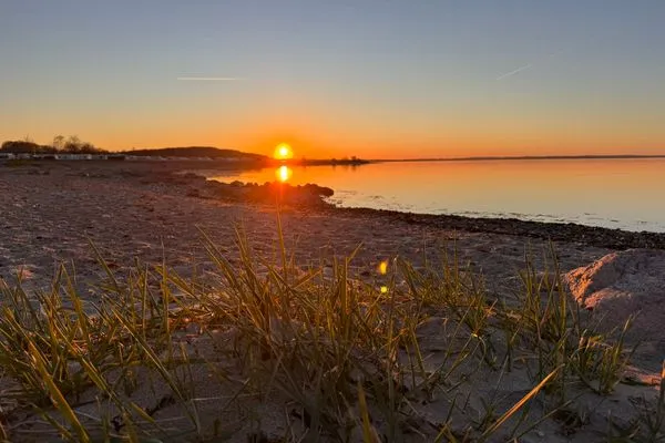 Sonnenuntergang am Strand von Westerholz (500 m zu Fuß)  Nordlicht