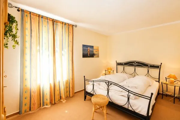 Schlafzimmer  Ostseewelle Ferienwohnung 13