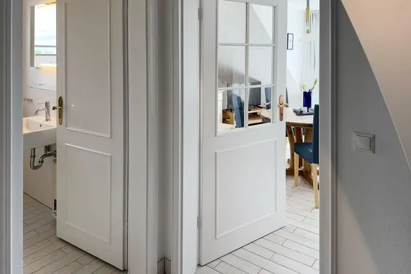 Flur zum Bad  Ferienwohnung „Südspitze 10 mit Meerblick"