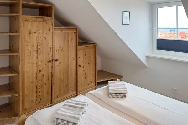 Schlafzimmer  Ferienwohnung „Südspitze 10 mit Meerblick"