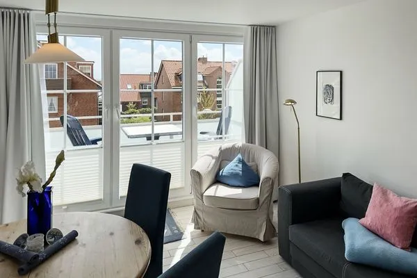 Wohnzimmer  Ferienwohnung „Südspitze 10 mit Meerblick"