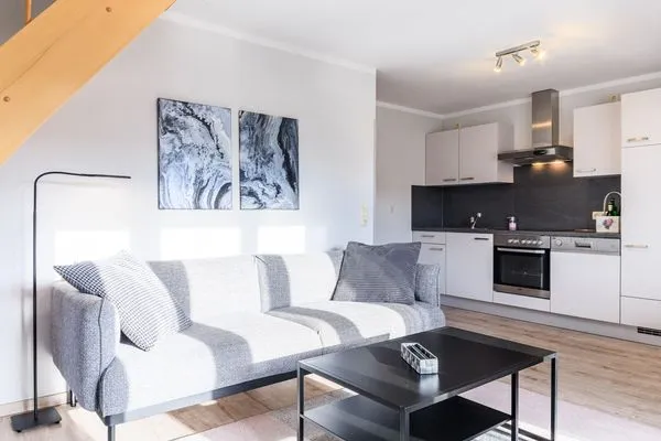 Wohnbereich mit Sofa  Zur Wellenwiese 15