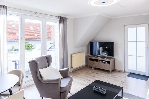 Wohnbereich mit TV  Zur Wellenwiese 15