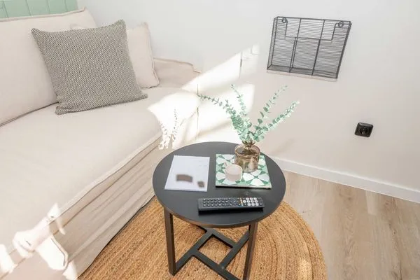 Wohnzimmer Green Village Ferienwohnung Igelnest